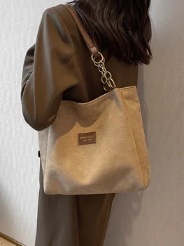 Стильная женская сумка-тоут из замши большого объема с сумкой через одно плечо